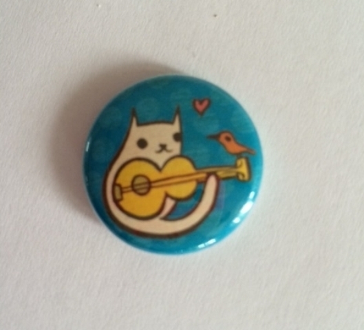 Guitar Button Cat Feeder for Feral Cats